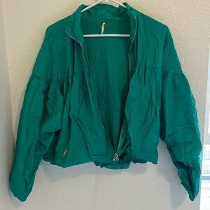 Free People green athletic jacket.